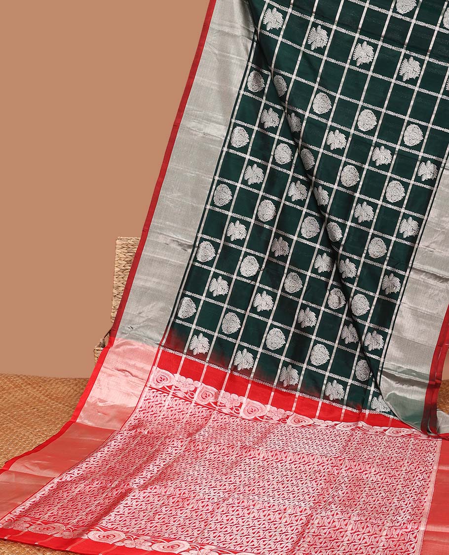 Green motifs enclosed with checked design vengatagiri pure silk saree , contrast bavanji border & pallu of ogee pattern