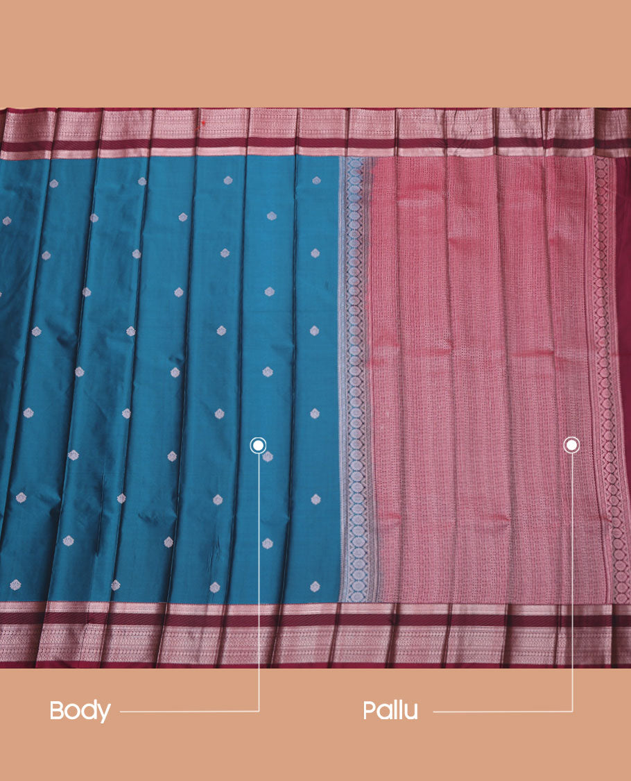 Blue Budget Silk Saree, Gracefully Embellished with Zari Buttas All Over Its Body, Complemented by a Contrast Traditional Zari Design Border, Geometric-Patterned Pallu, and Paired with a Contrast Blouse