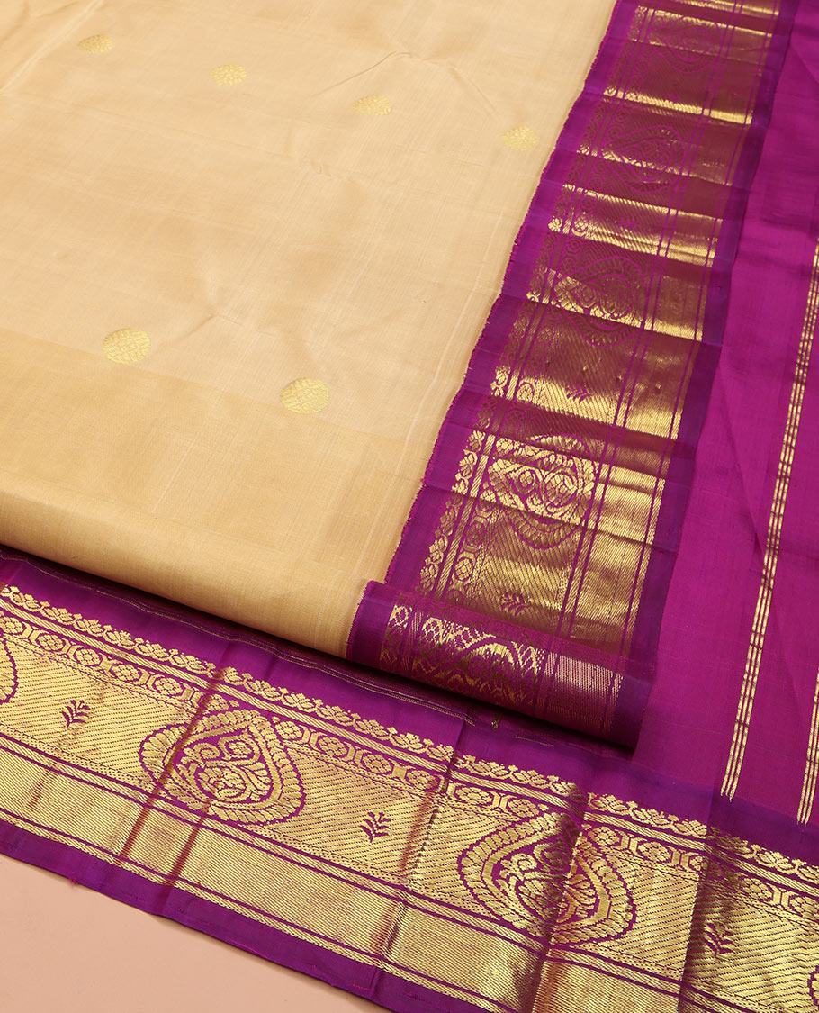 Sandal Kanchipuram Silk Saree, Showcasing Zari Buttas on Its Body, Complemented by Contrast One-Sided Border, Pallu Features Floral and Bird Designs, and Comes Without a Blouse