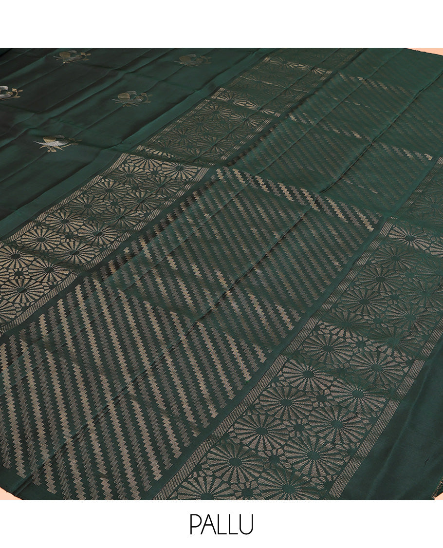Borderless Green Mayuri Lite Silk Mix Saree, Detailed with Bird Buttas All Over Its Body, Highlighted by a Zari Pallu of Diagonal Stripes and Chakram Designs, and Paired with a Matching Blouse