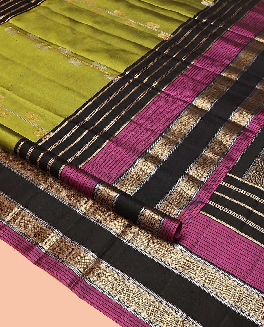 Green Mayuri Soft Silk Saree, Woven with Zari Buttas All Over Its Body, Complemented by a Contrast Border of Traditional Zari Designs, Pallu of Vanki Designs, and Paired with a Contrast Blouse