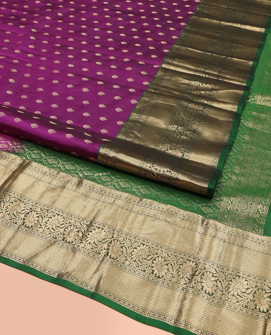 Purple Vasundhara Lite Silk Mix Saree, Adorned with Zari Buttas All Over Its Body, Complemented by a Contrast Border of Rekku, Muthu, Vanki, Kodi Visiry, and Laddu Kamalam Designs, Gracefully Embellished Pallu, and Paired with a Contrast Blouse
