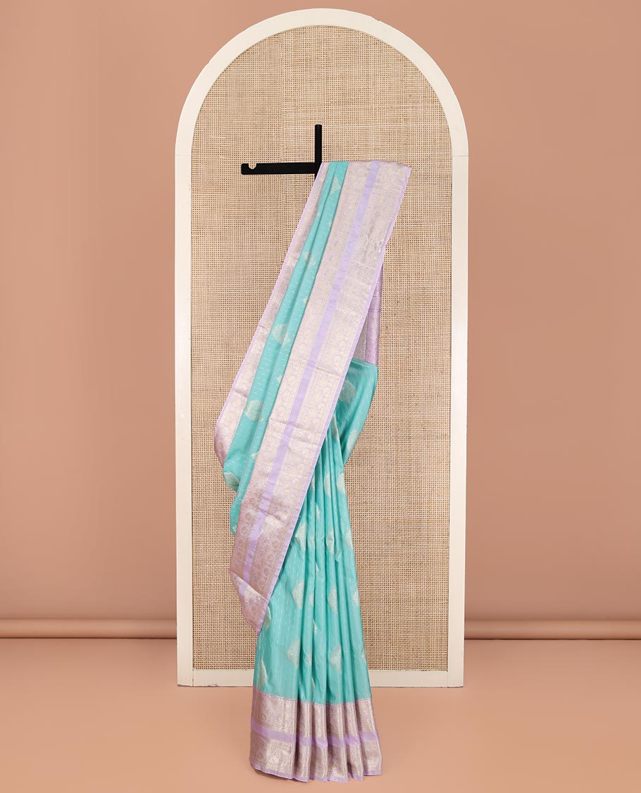 Blue Budget Silk Saree, Steeped in the Richness of Zari Buttas All Over Its Body, Complemented by Contrast Varisai Pettu Traditional Zari Design Border, an Intricately Designed Pallu, and Paired with a Contrast Blouse