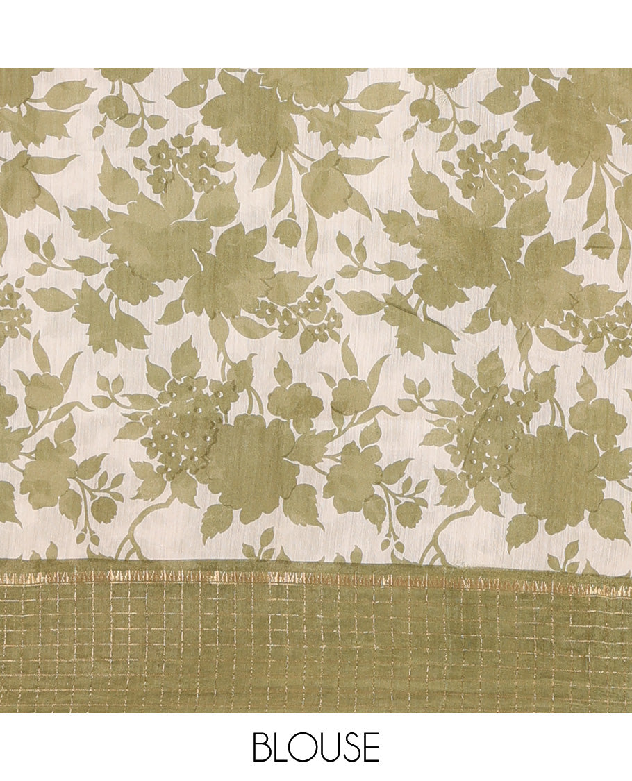 Light olive green silhouettes floral printed Muga silk saree, contrast temple zari checked border, and zari striped pallu