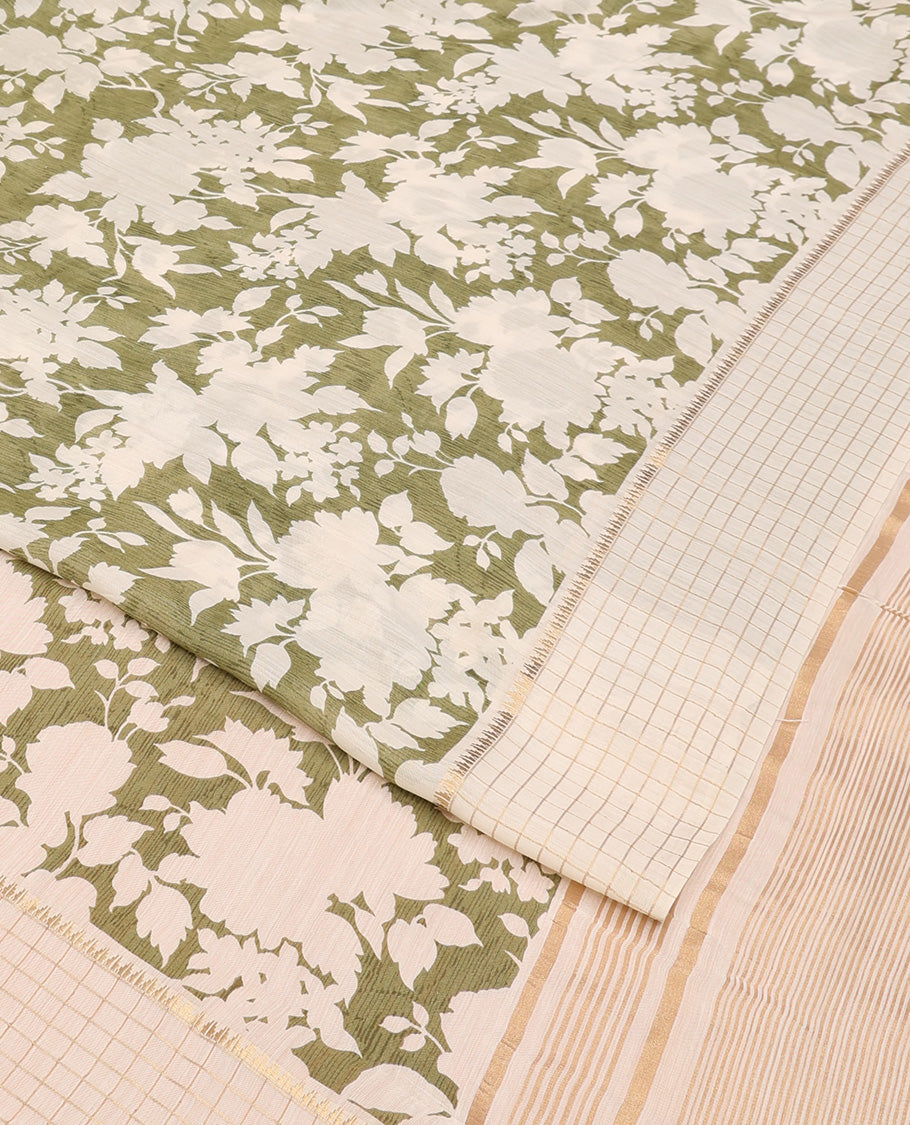 Light olive green silhouettes floral printed Muga silk saree, contrast temple zari checked border, and zari striped pallu