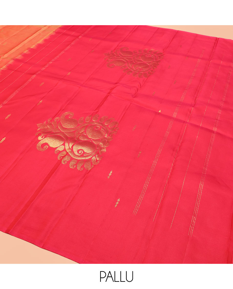 Orange Kanchipuram Silk Saree Featuring All-Over Zari Buttas, Accentuated by a Contrast Border with Flower Zari Buttas, and a Pallu Adorned with Manga Motifs, Paired with a Contrast Plain Blouse