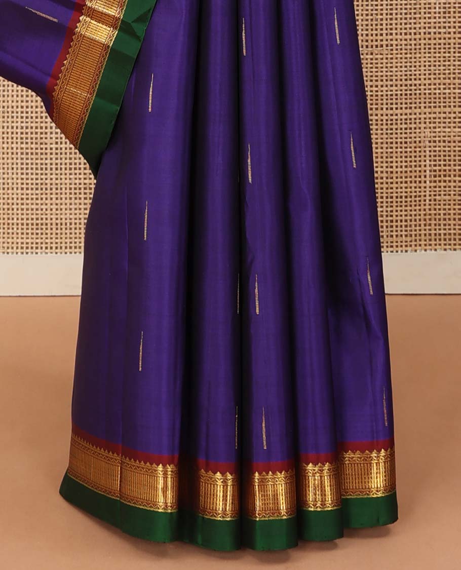 Blue malli mokku buttas Kanchipuram silk saree, contrast border of rekku, neli, and zari designs, and zari woven pallu