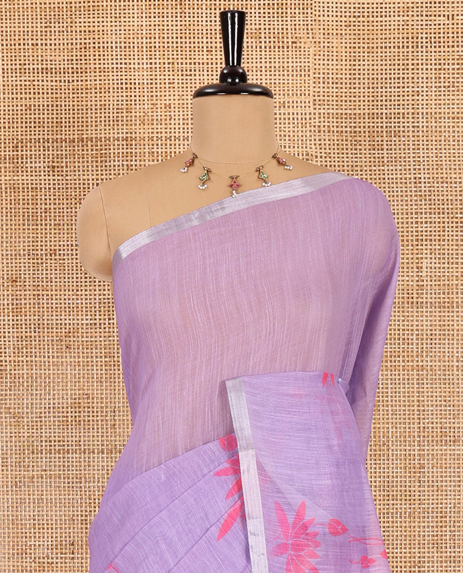 Lavender Pichwai lotus printed linen cotton saree, piping zari border, colorful tasselled lotus printed pallu, and a contrast lotus printed blouse