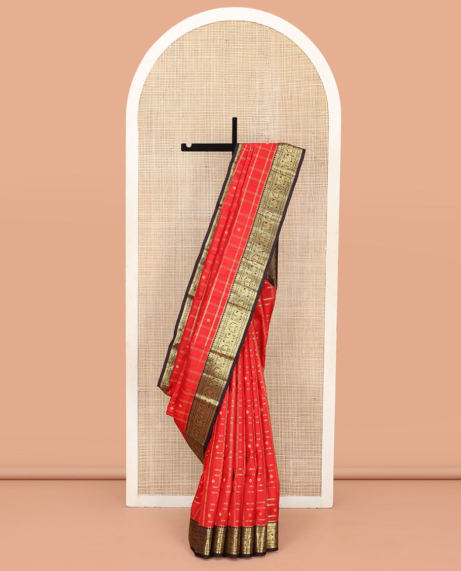Orange Vasundhara Silk Saree, Richly Detailed with Zari Butta Enclosed Checks All Over Its Body, Complemented by a Contrast Border of Rekku, Muthu, Banaras, Mayil, and Manga Designs, Grand Pallu, and Paired with a Contrast Blouse
