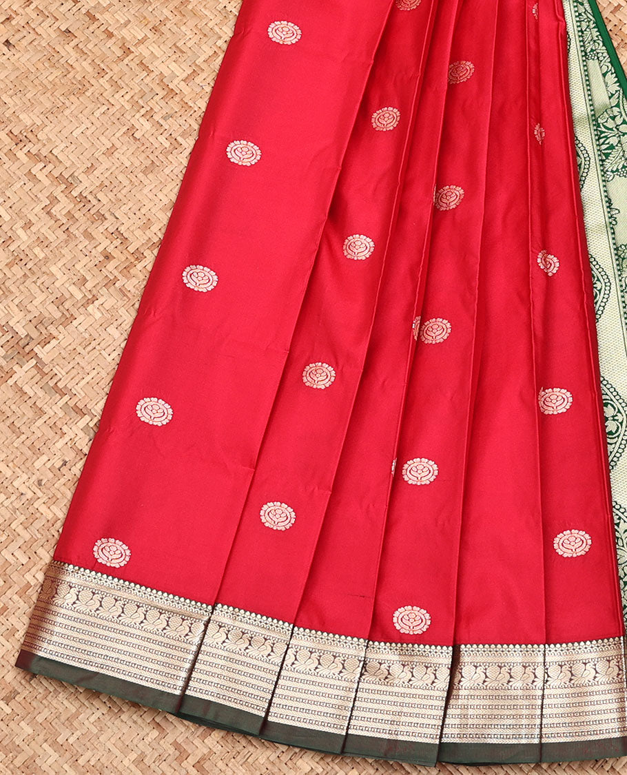 Red Budget Silk Saree, Decked Up with Round Buttas All Over Its Body, Complemented by a Contrast Traditional Zari Border, Grand Floral Design Pallu, and Paired with a Contrast Blouse