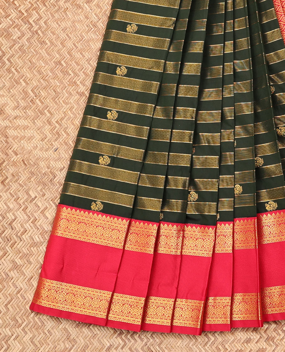 Green Budget Silk Saree, Styled with Zari Stripes and Peacock Buttas on Its Body, Complemented by a Contrast Traditional Zari Design Rettai Pettu Border, Grand Jaal Pallu, and Paired with a Contrast Blouse