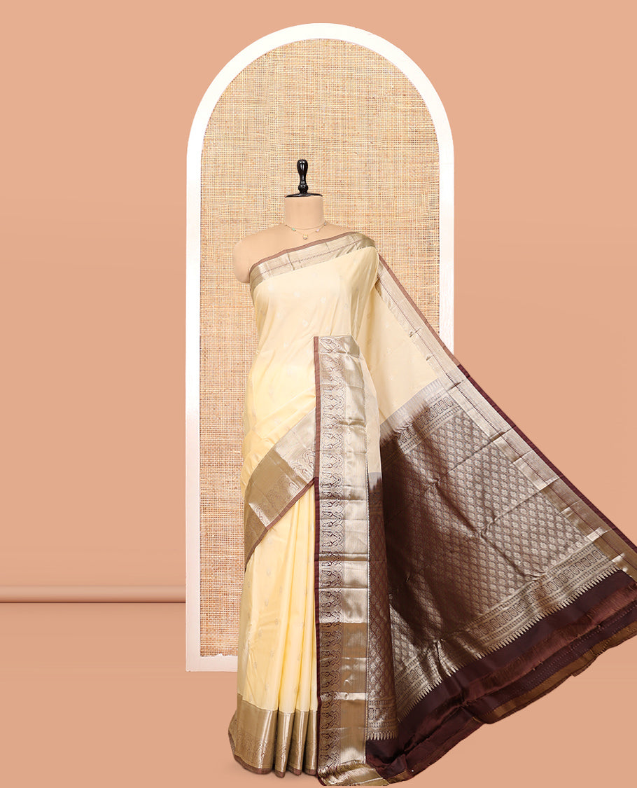 Light Sandal Budget Silk Saree, Sparsely Sparkled with Zari Buttas, Complemented by a Contrast Traditional Zari Border, Pallu of Jaal Design, and Contrast Blouse