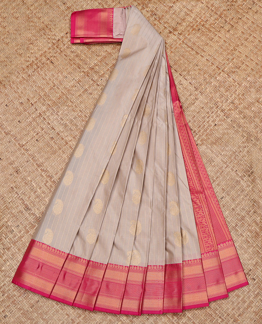 Grey Budget Silk Saree, Sparsely Woven with Paisley Buttas and Stripes All Over Its Body, Complemented by a Contrast Traditional Zari Border, Grand Pallu, and Paired with a Contrast Blouse