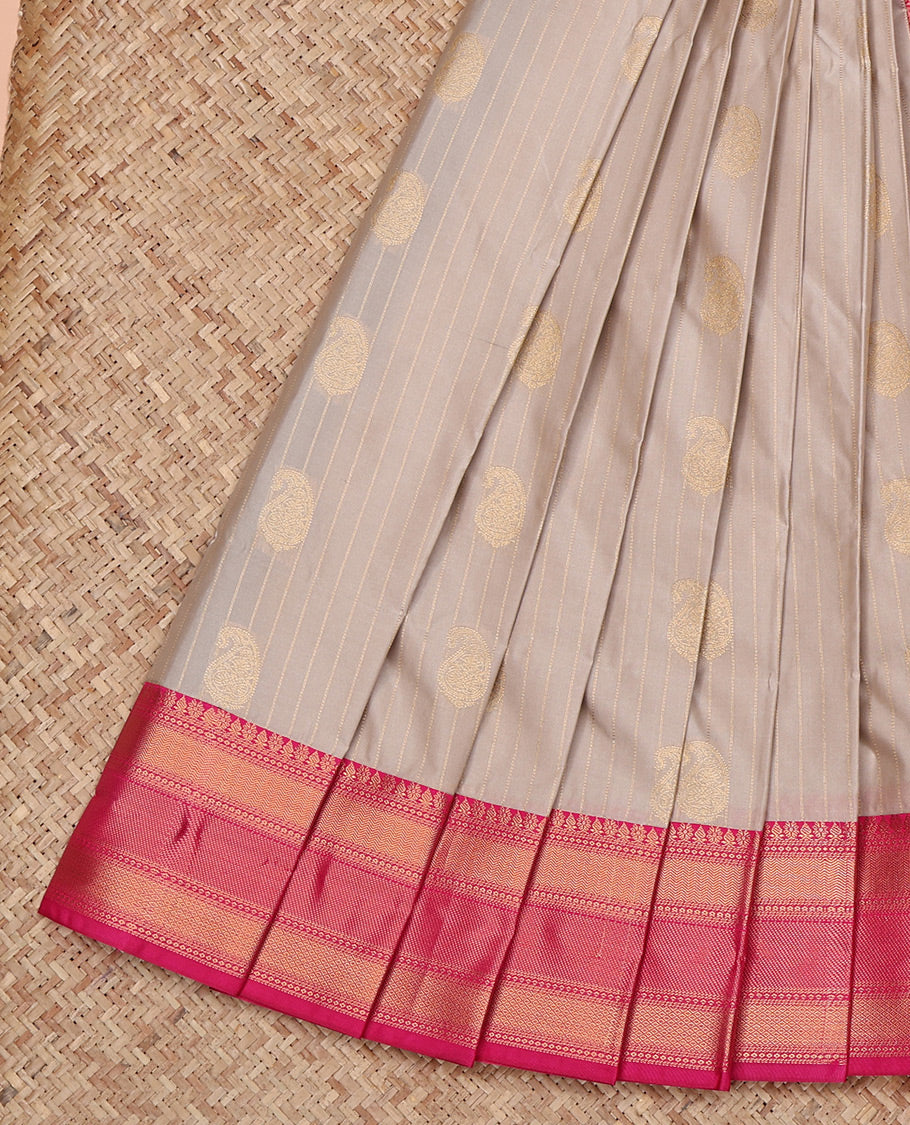 Grey Budget Silk Saree, Sparsely Woven with Paisley Buttas and Stripes All Over Its Body, Complemented by a Contrast Traditional Zari Border, Grand Pallu, and Paired with a Contrast Blouse
