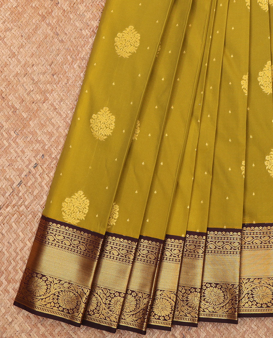 Green Budget Silk Saree, Prettified with Zari Buttas All Over Its Body, Complemented by a Contrast Traditional Zari Design Border of Floral Creeper Designs, Mughal-Style Intricately Designed Pallu, and Paired with a Contrast Blouse