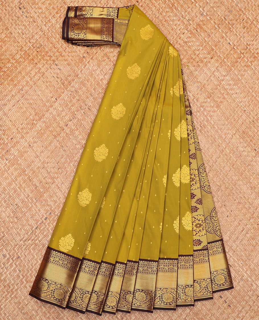 Green Budget Silk Saree, Prettified with Zari Buttas All Over Its Body, Complemented by a Contrast Traditional Zari Design Border of Floral Creeper Designs, Mughal-Style Intricately Designed Pallu, and Paired with a Contrast Blouse