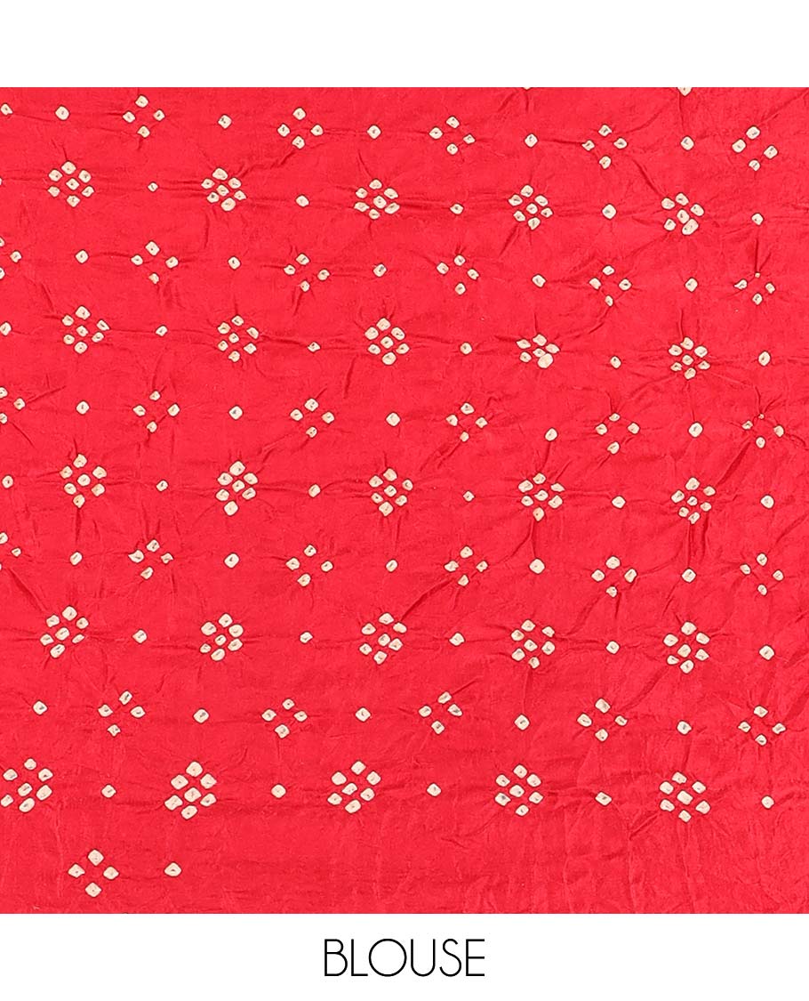 Multi-color geometric printed bandhani silk saree, contrast bandhani dots printed border, and dots enclosed zari checked pallu