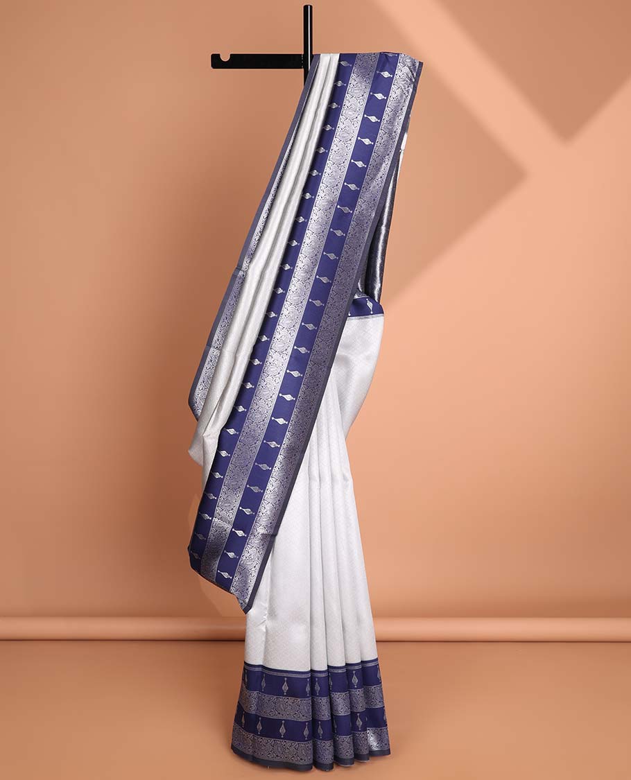Grey floral jacquard litchi silk saree with contrast floral design border & intricate floral zari design pallu