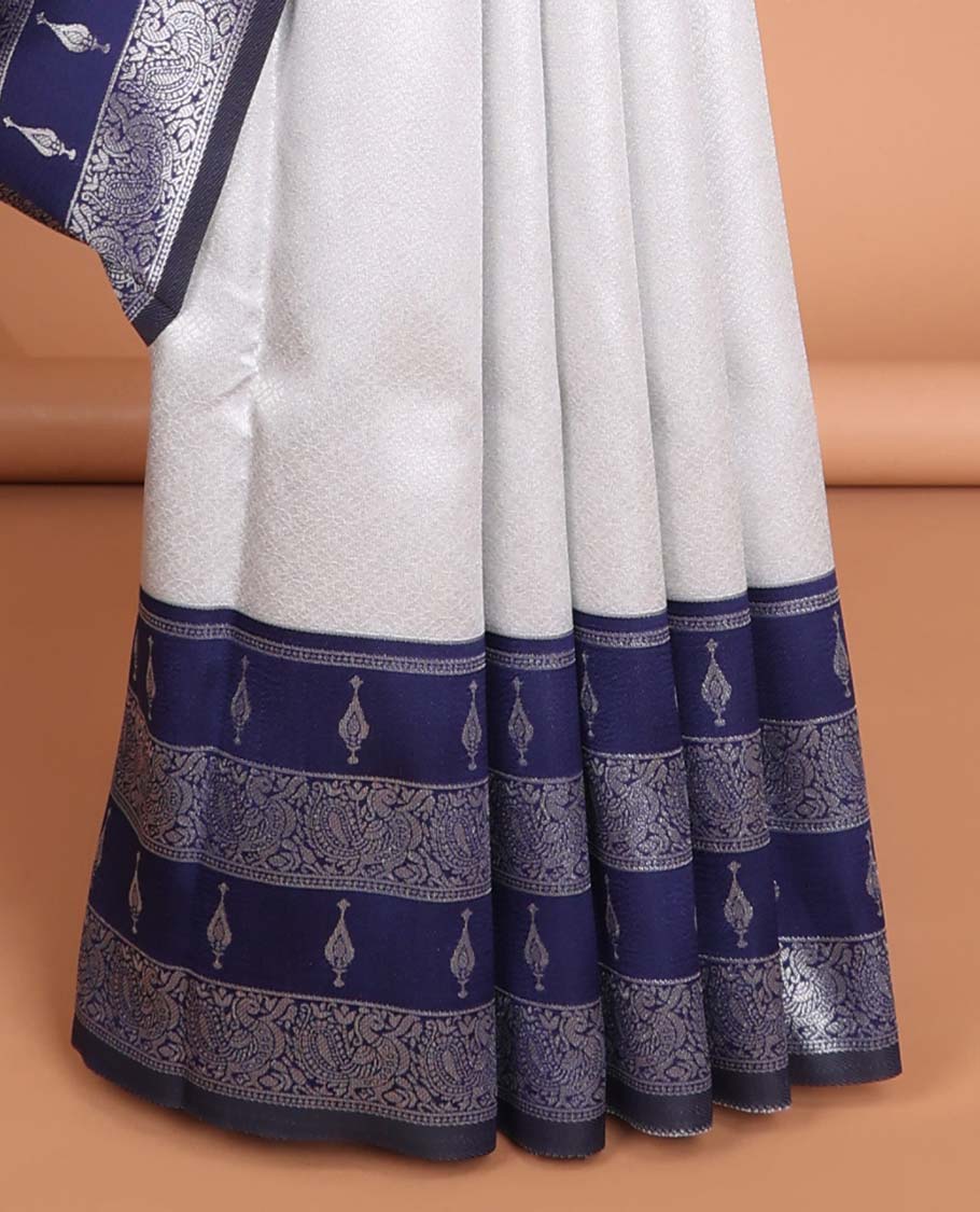 Grey floral jacquard litchi silk saree with contrast floral design border & intricate floral zari design pallu