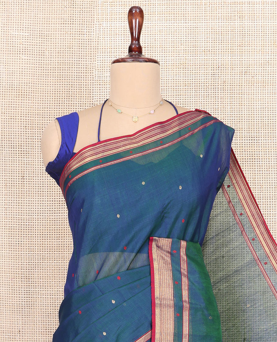 Blue Chanderi Cotton Saree, Showcasing Buttas All Over Its Body, Complemented by a Contrast Border, Pallu Steeped with Zari Stripes, and Paired with a Matching Blouse