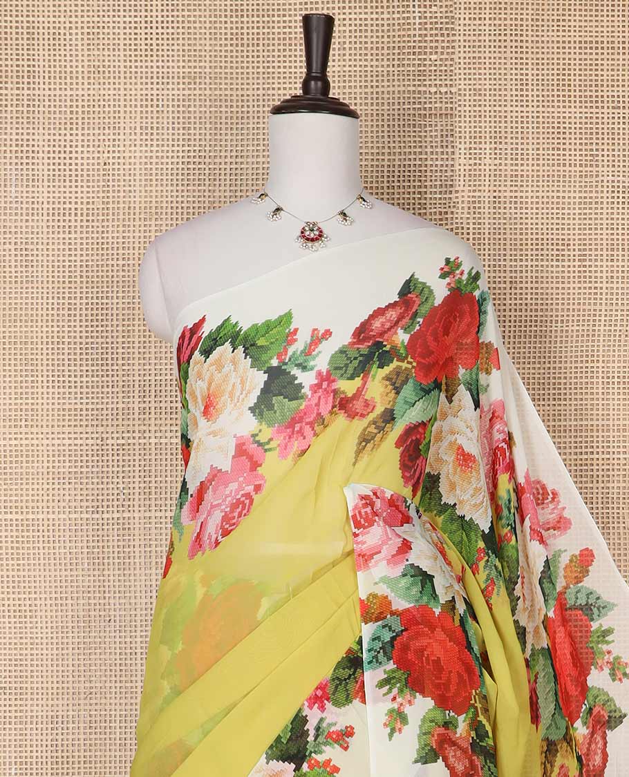 Yellow georgette saree with contrast floral design border