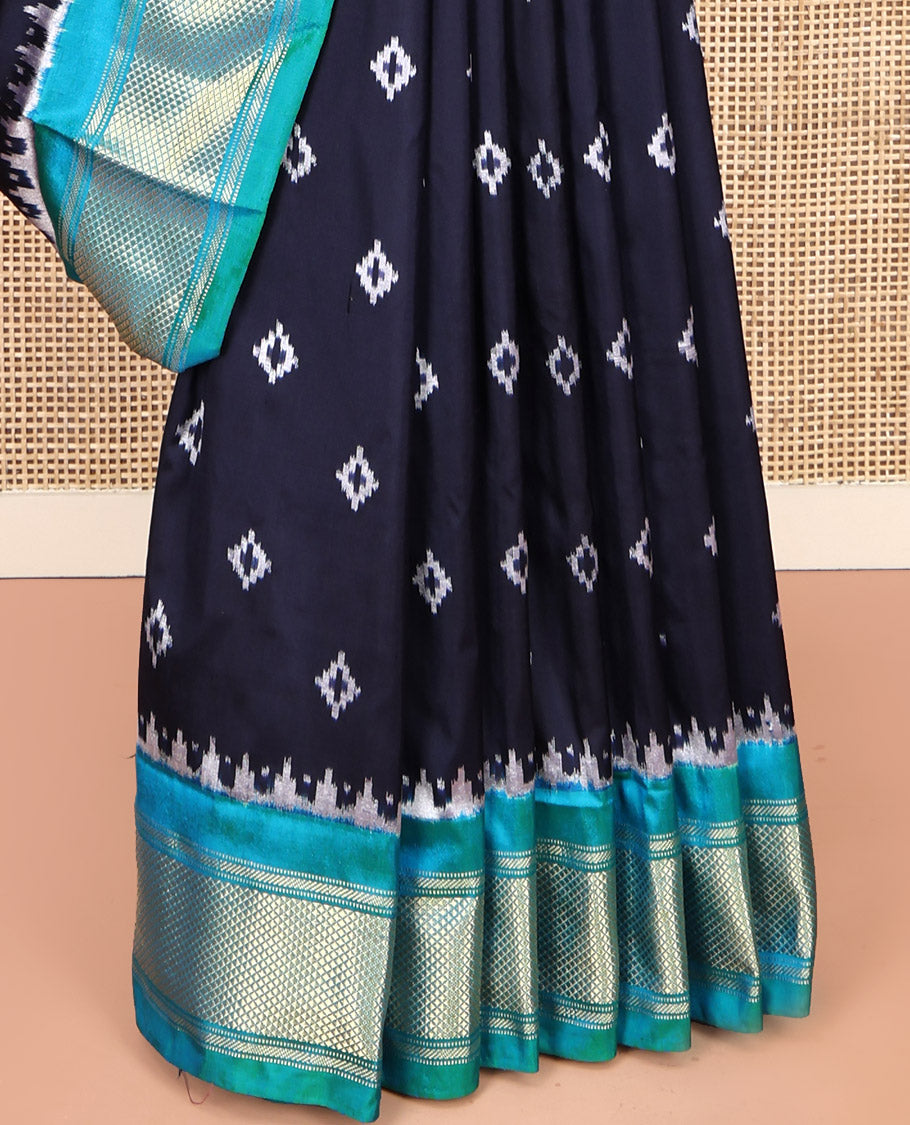 Blue Pochampally Ikat Silk Saree, Accentuated with Ikkat Buttas on Its Body, Complemented by Contrast Temple Traditional Design Border, Pallu of Intricate Patterns, and Paired with a Contrast Blouse
