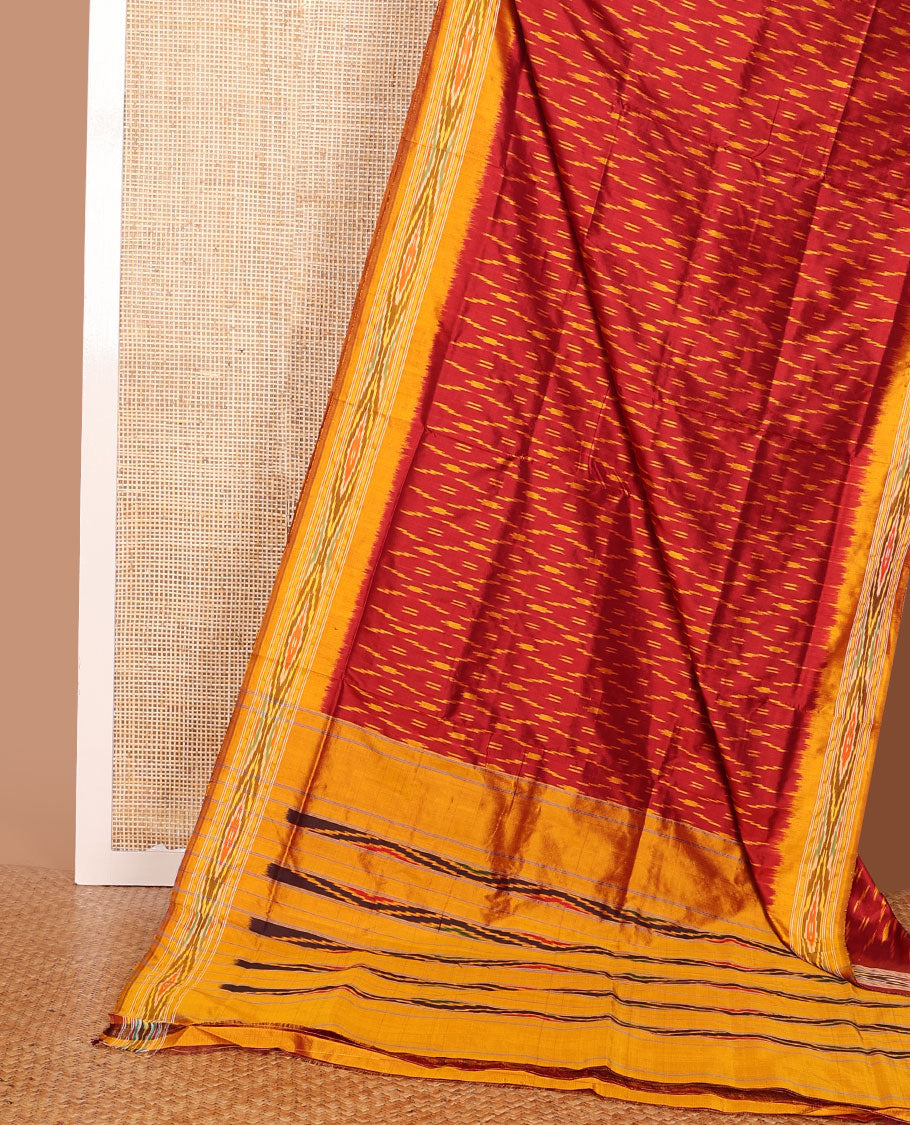 Red ikkat saree with unique buttas, contrast ikkat border & pallu of ikkat designs