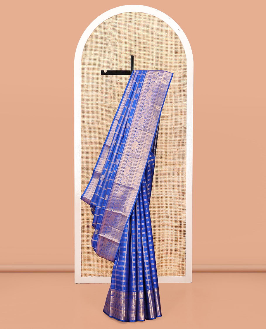 Blue Kanchipuram Silk Saree, Adorned with Zari Buttas and Checks, a Zari Border of Rekku, Kathir, Muthu, Rudraksham, Rekku, Yaanai, Chakram, and Paiyaddi Kattam, Jaal Pallu, Matching Blouse