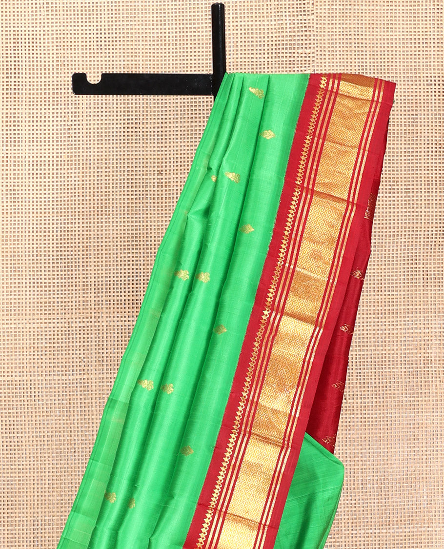 Green Kanchipuram Silk Saree, Decorated with Zari Buttas, Contrast Korvai Border of Thilakam Mokku, Banaras, and Mayil Kann, Pallu of Zari Design, and No Blouse
