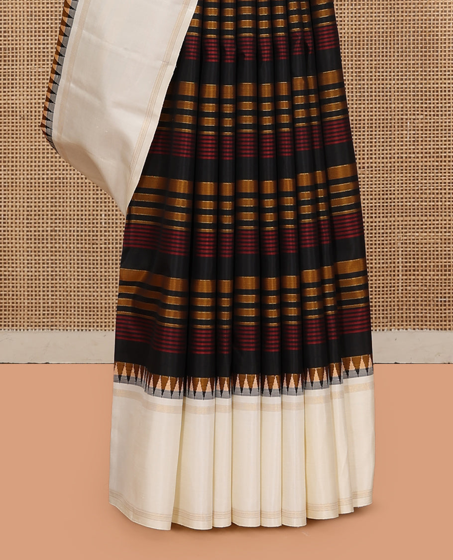 Black Striped Kanchipuram Silk Saree, Complemented by a Contrast Bodi Thazampoo Rekku Border, Zari Striped Pallu, and a Contrast Blouse