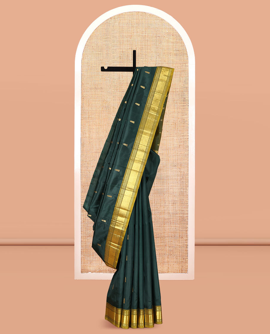 Green Kanchipuram Silk Saree Featuring Zari Buttas, Complemented by a Contrast One-Sided Border of Panner Sombu, Banaras, and Jaal Designs, Zari Design Pallu, and a No Blouse