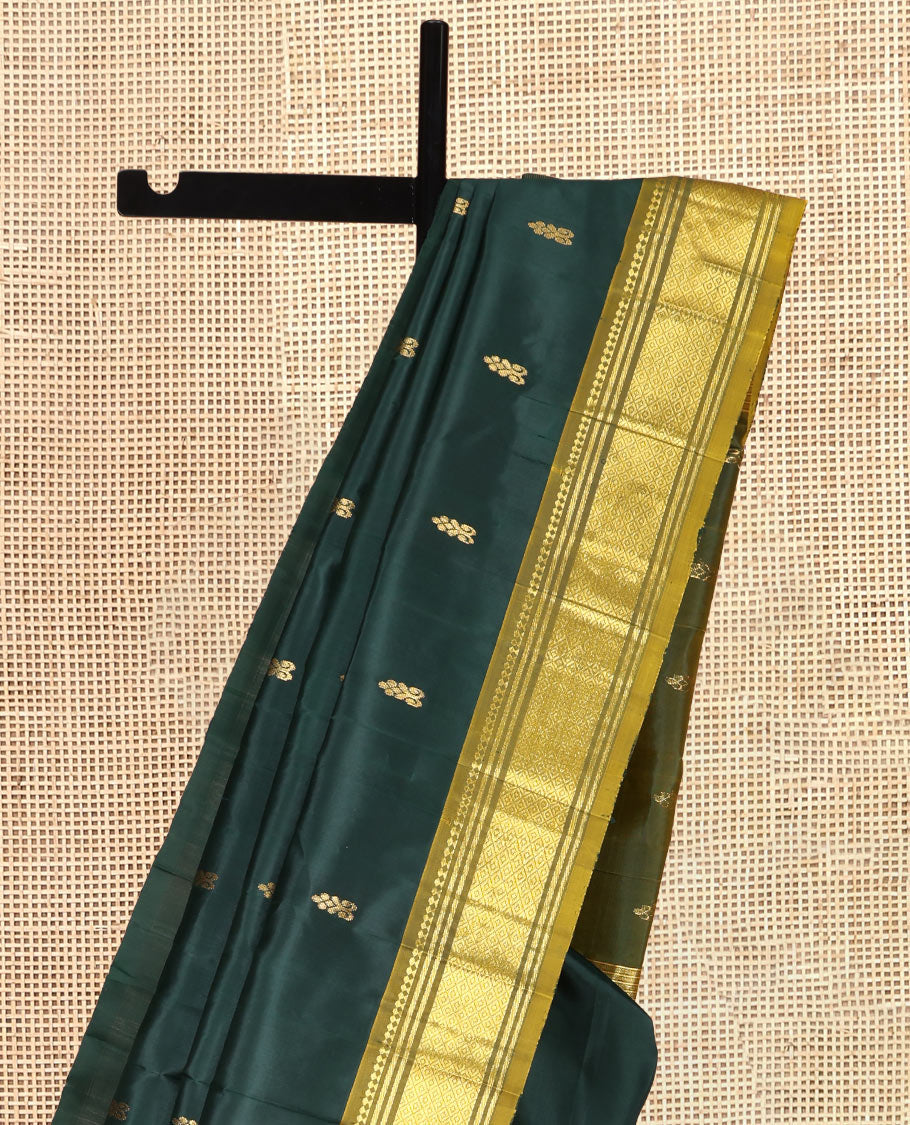 Green Kanchipuram Silk Saree Featuring Zari Buttas, Complemented by a Contrast One-Sided Border of Panner Sombu, Banaras, and Jaal Designs, Zari Design Pallu, and a No Blouse