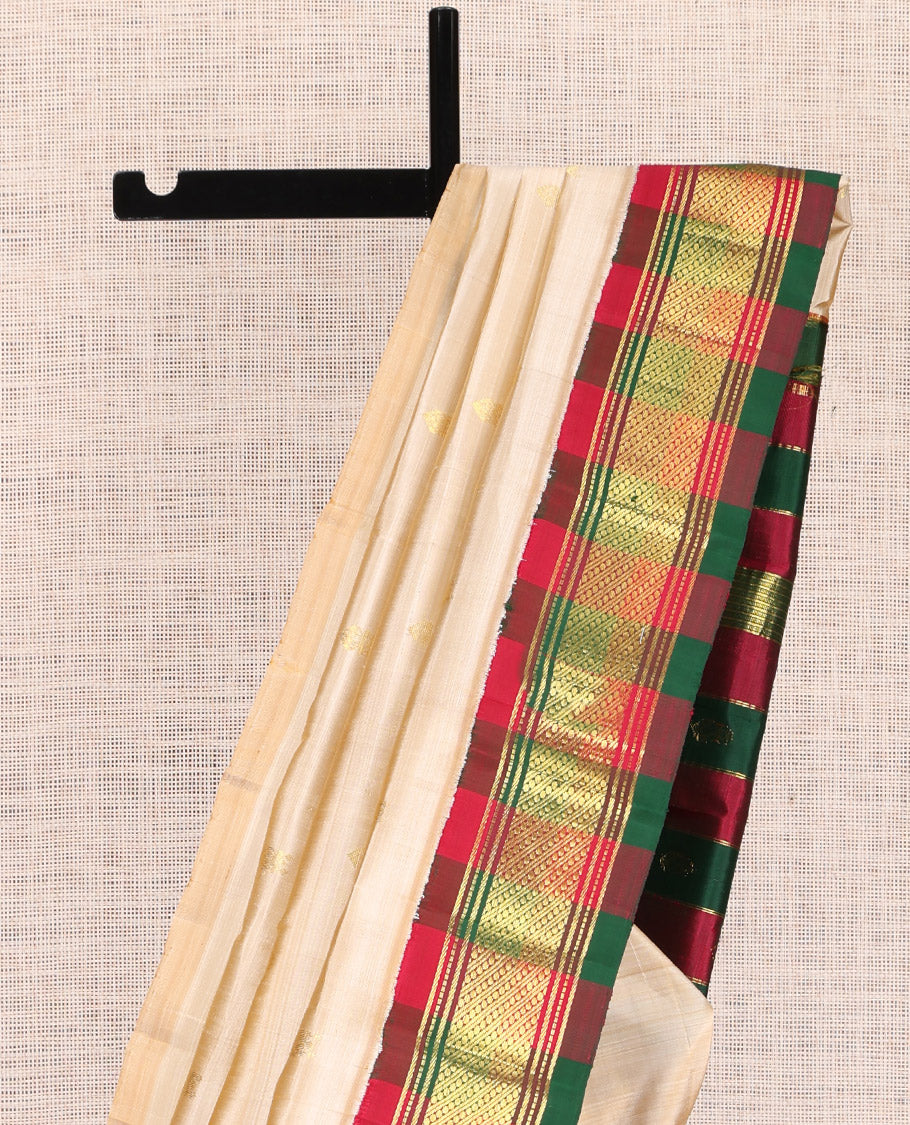 Sandal Kanchipuram Silk Saree, Sparsely Woven with Zari Buttas, a Contrast Korvai One-sided Border of Traditional Designs, Zari Woven Pallu, and No Blouse