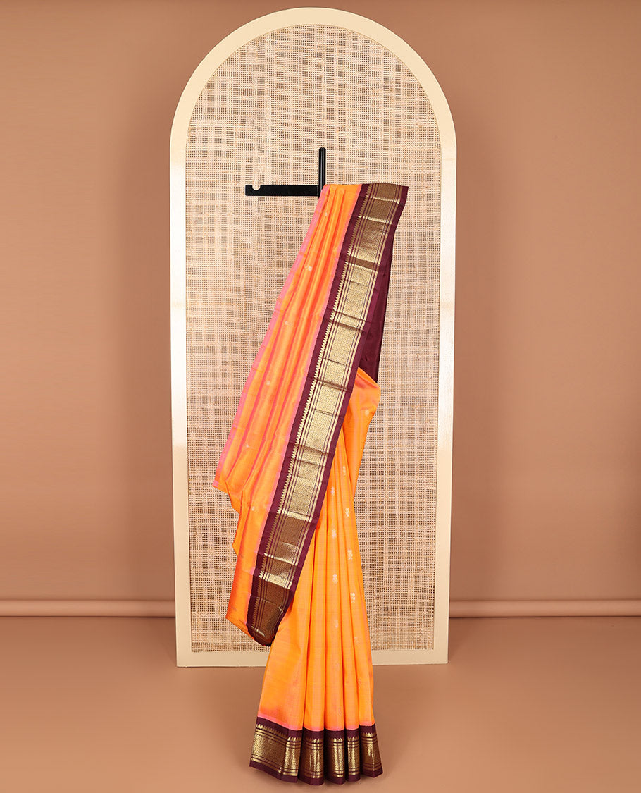 Orange buttas kancheepuram silk saree with contrast korvai border of banaras, thilakam mokku design & zari design border