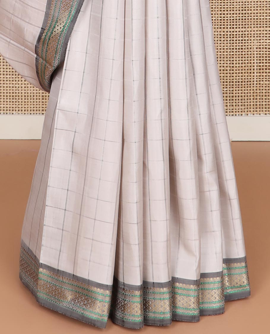 Light grey checked kancheepuram silk saree with contrast intricate design border & striped pallu