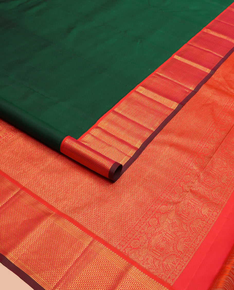 Green plain Kanchipuram silk saree, contrast border of thilakam mokku, muthu, banaras, and ara maadam designs, and ara maadam design pallu