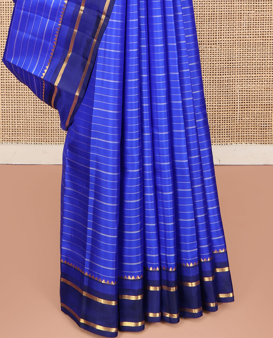 Blue Kanchipuram Silk Saree, Elevated with Stripes All Over Its Body, Complemented by Contrast Temple Zari Border, Subtly Zari-Striped Pallu, and Paired with a Contrast Blouse