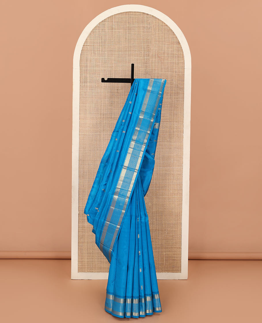 Blue zari buttas Kanchipuram silk saree, one-sided zari border of rekku, banaras, diamond, and muthu designs , and zari design pallu