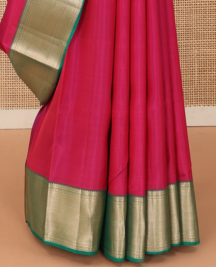 Red plain Kanchipuram silk saree, contrast border of thilakam, banaras, kuyil kann, and rudraksham designs, and jaal pallu