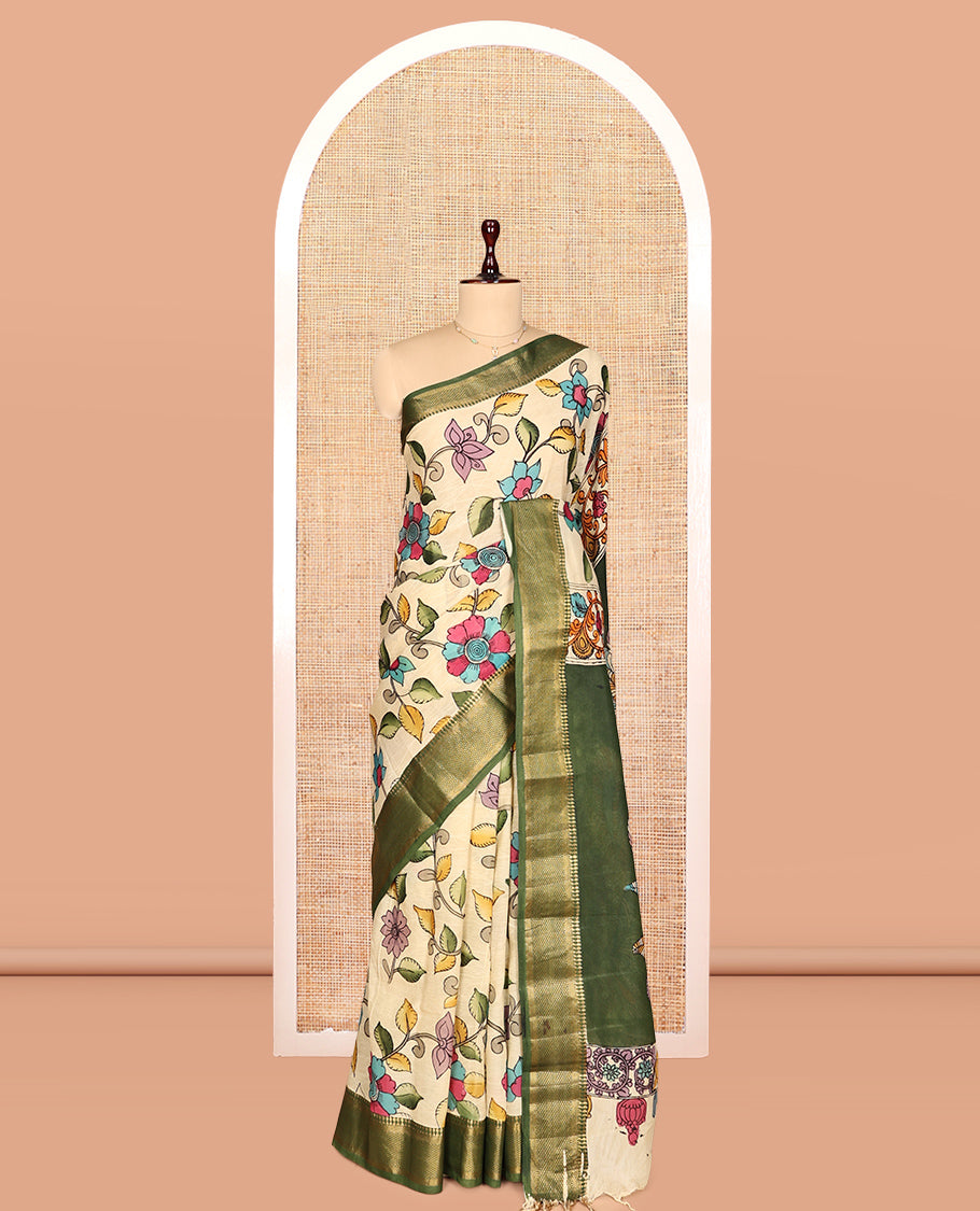 Light Yellow Kalamkari Silk Saree, Elegantly Framed with Floral Vine Print, a Contrast Traditional Zari Border, Pallu Features Peacocks, and a Contrast Blouse