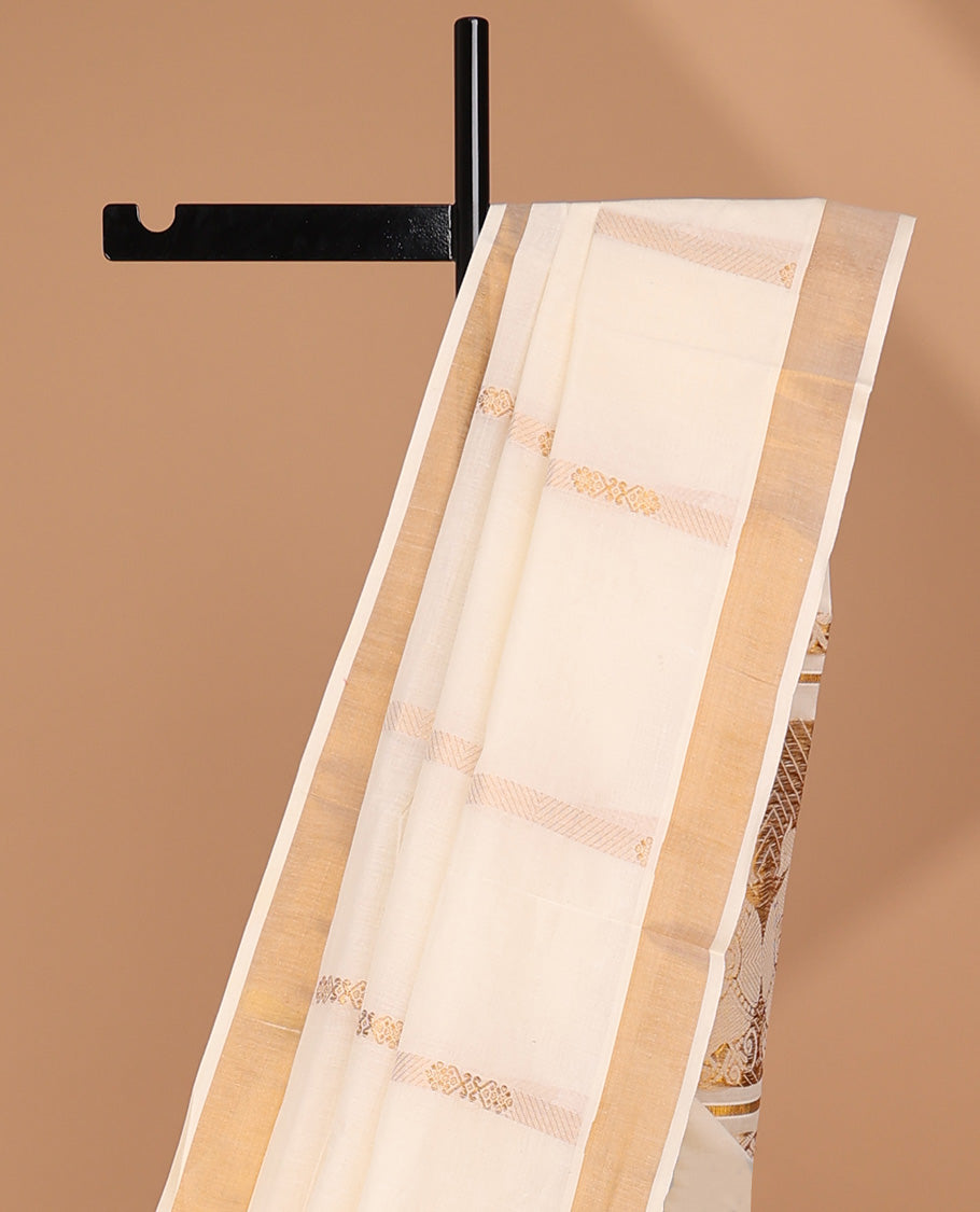 Cream kerala saree with zari stripes, zari border & pallu of peacocks