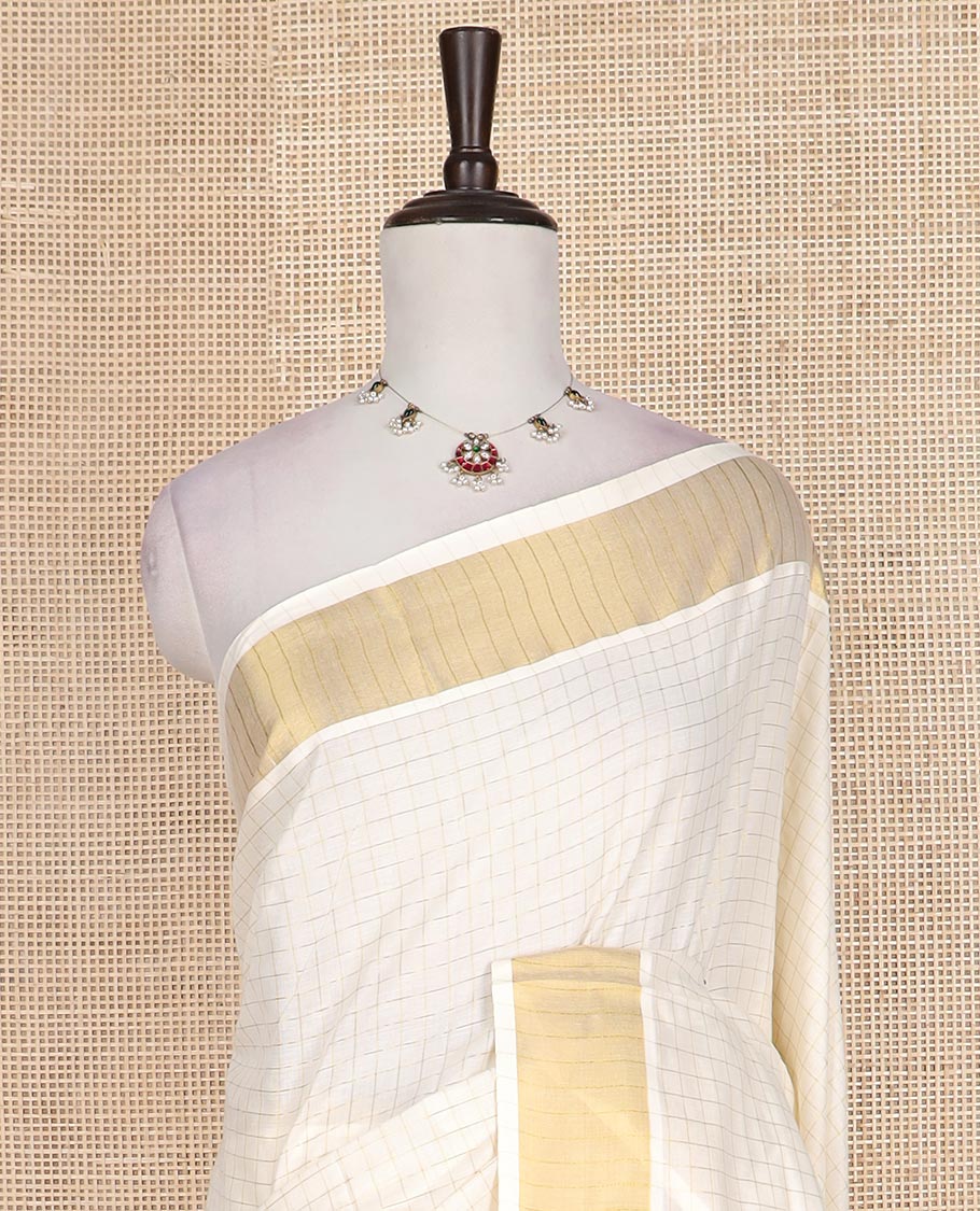 Cream zari checked Kerala cotton saree, zari border, and zari checked design pallu
