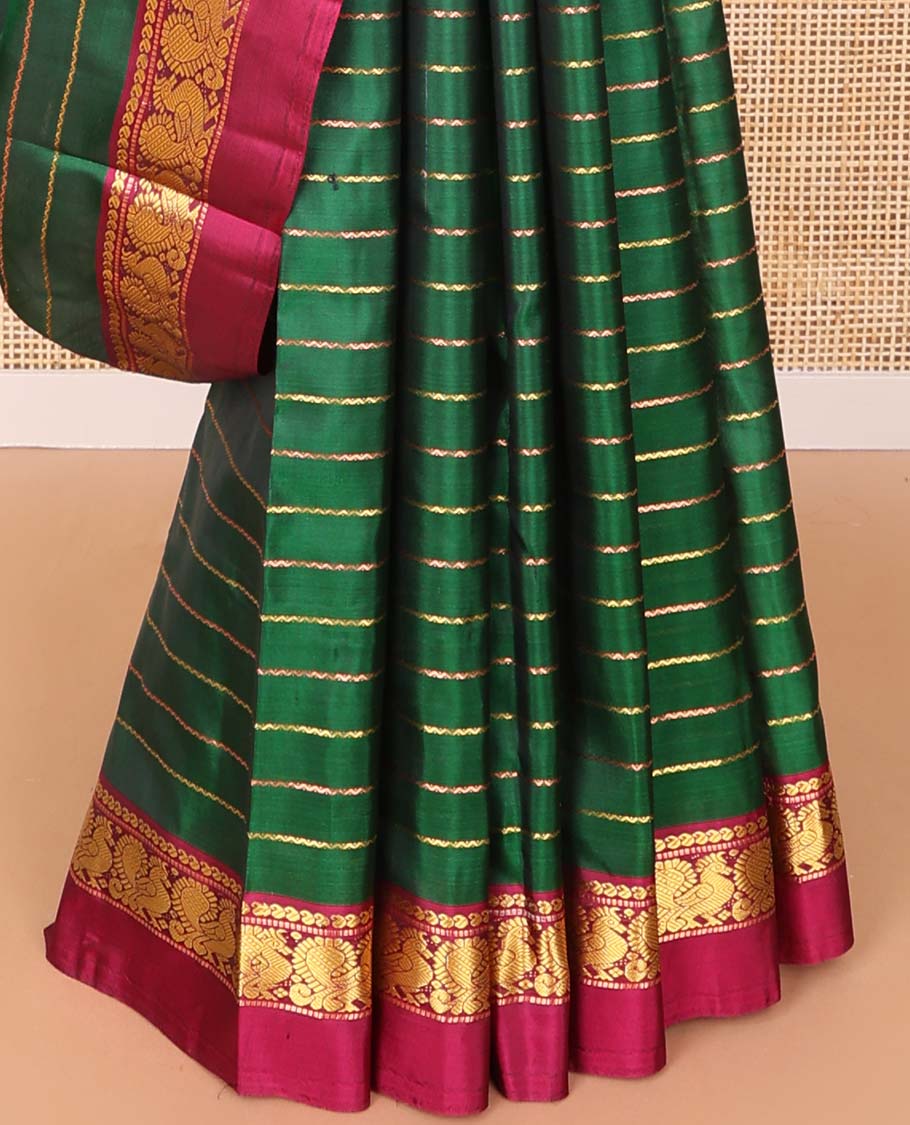 Green striped kancheepuram silk saree with contrast ganga jamuna border of paisley, mayil design & zari design pallu