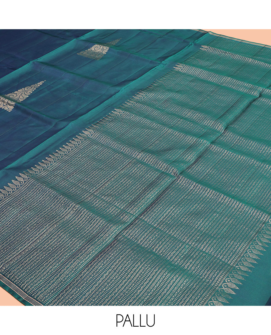 Peacock Blue Mayuri Lite Silk Mix Saree, Highlighted by Zari Buttas, a Subtle Piping Border, Pallu Steeped with Geometric Designs, and a Matching Blouse
