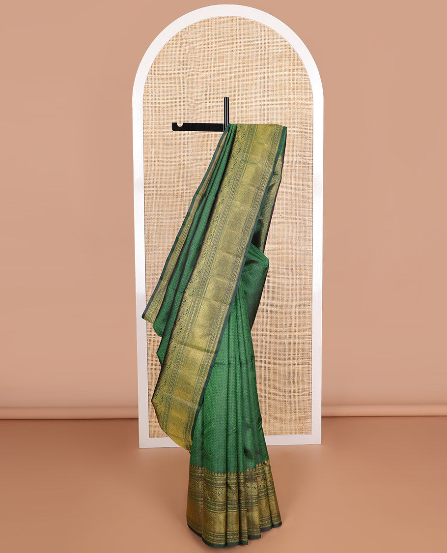 Green checked, floral design silk saree with self border of manga, paun, muth, kathir design & jaal design pallu