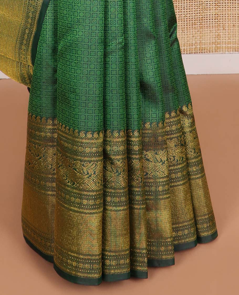 Green checked, floral design silk saree with self border of manga, paun, muth, kathir design & jaal design pallu