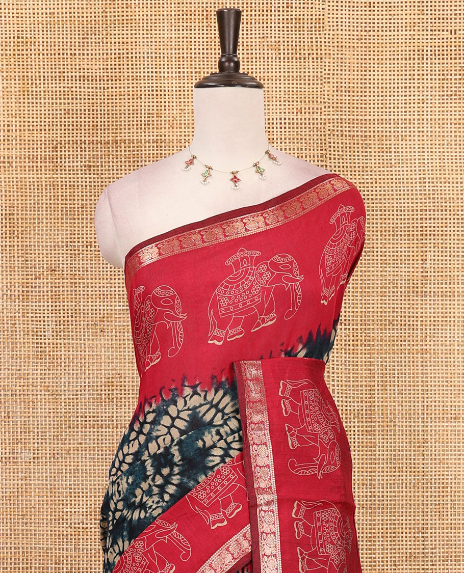 Blue diamond patterns Shibori-style printed muslin cotton saree, contrast elephant motifs printed border, batik elephant motifs pallu & contrast flower buttas printed blouse