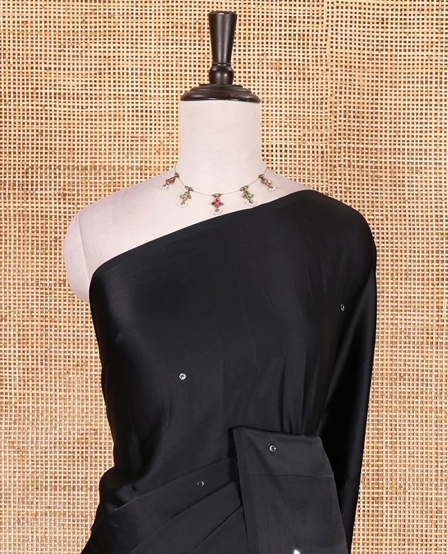 Borderless black mirror work Gaji silk saree, contrast ajrakh-style printed pallu, and intricately printed blouse