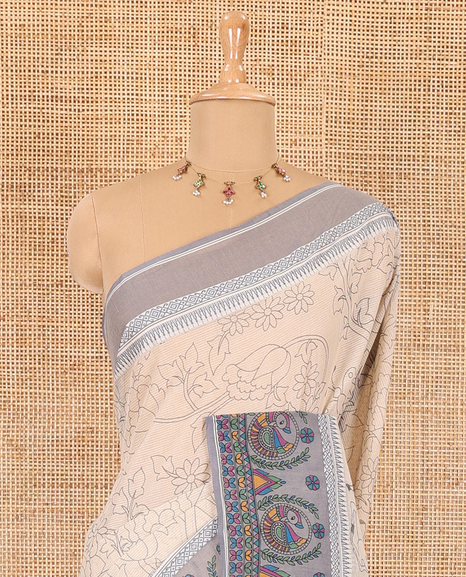 Chikku-grey floral, and dear motifs printed mangalagiri cotton saree, contrast resham thread traditional temple border of Madhubani floral-peacock print, printed pallu, and a contrast blouse
