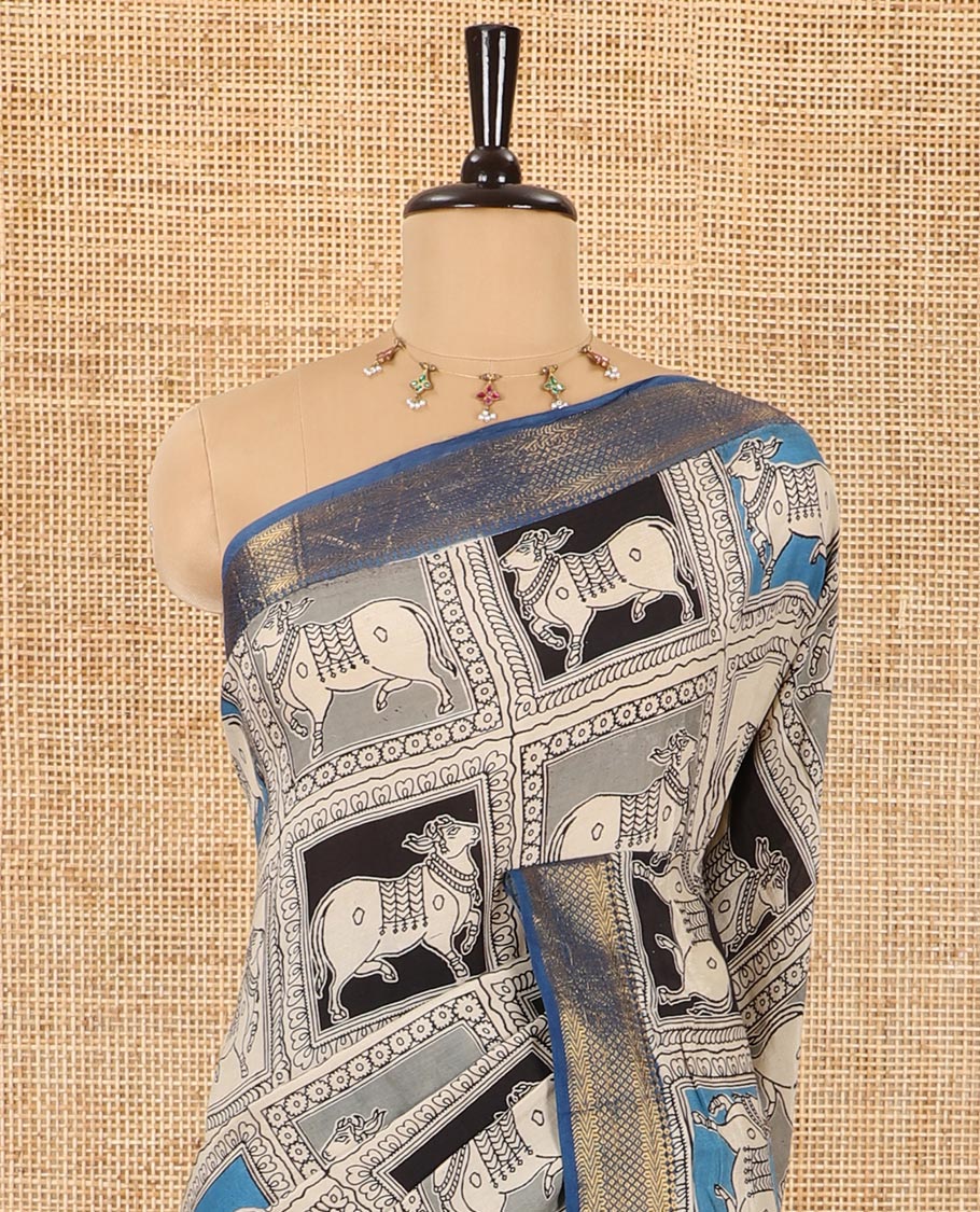 Black kalamkari-style pichwai printed Mangalagiri cotton saree with contrast traditional zari border, kalamkari printed pallu, and a floral vine printed blouse